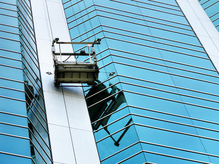 washing platform on windows in the office buildingの写真素材