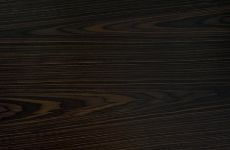 Ebony background - black, dark, expensive wood.の写真素材