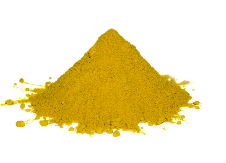 Yellow spice isolated on white backgroundの写真素材