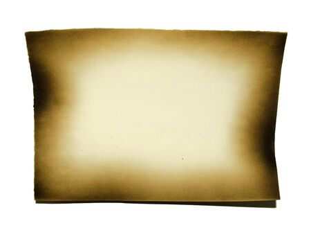 Burned paper on white background with clipping pathの写真素材