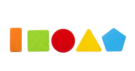 Colorful wooden toy blocks in geometric shapes. Orange rectangle, green square, red circle, yellow...