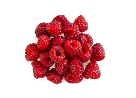 Heap of ripe raspberry isolated on white