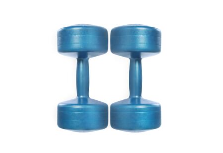 Two blue dumbbells for fitness isolated on white background. Studio shot. Clipping path included. Flat laz.の写真素材