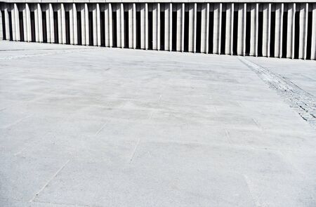 Pavement background made by stone with architecture stipes wall. Lots of copy space for your textの写真素材