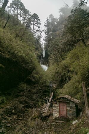 small hut in the deep valleyの写真素材