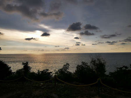 Sunset over the sea. Sunset on the sea. Sunset on the seashore.
