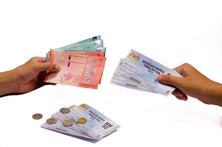 Kuala Lumpur, Malaysia - April 19, 2015: The 1Malaysia Book Voucher or Baucar Buku 1Malaysia (BB1M) is an initiative by the Ministry of Higher Education (MOHE) in 2012 to help ease the financial burden of tertiary students all over Malaysiaのeditorial素材