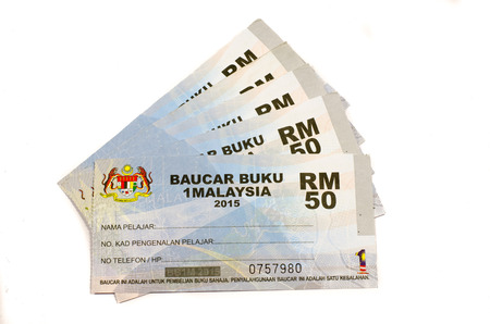 Kuala Lumpur, Malaysia - April 19, 2015: The 1Malaysia Book Voucher or Baucar Buku 1Malaysia (BB1M) is an initiative by the Ministry of Higher Education (MOHE) in 2012 to help ease the financial burden of tertiary students all over Malaysiaのeditorial素材