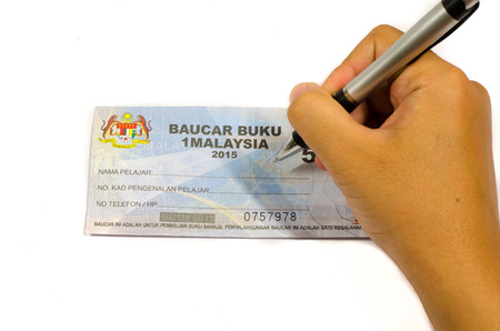 Kuala Lumpur, Malaysia - April 19, 2015: The 1Malaysia Book Voucher or Baucar Buku 1Malaysia (BB1M)...