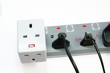 Three way electric socket isolated on white background