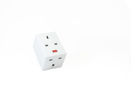 Three way electric socket isolated on white backgroundの写真素材
