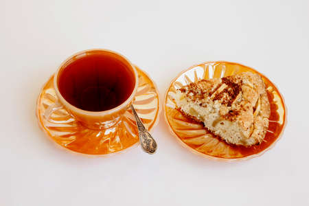 Tasty sweet breakfast. A cup with tea and pieの写真素材