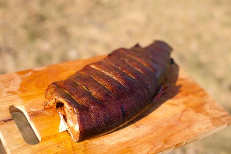 Prepared smoked fish on the cutting board