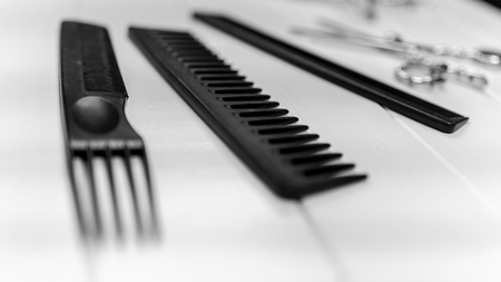 Professional haircut combs, scissors, clips, bowl, coloring brushes for hairstyle salonの写真素材