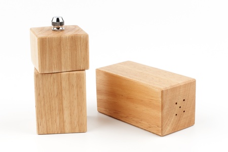 Wooden Salt and Pepper Shakers on a white backgroundの写真素材