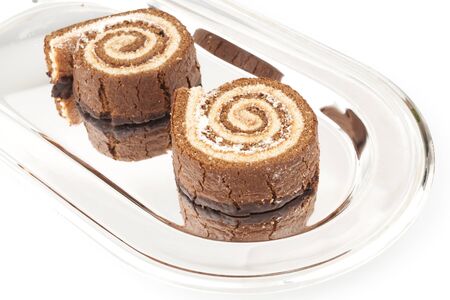 Two Sweet rolls on the shiny metal trayの写真素材