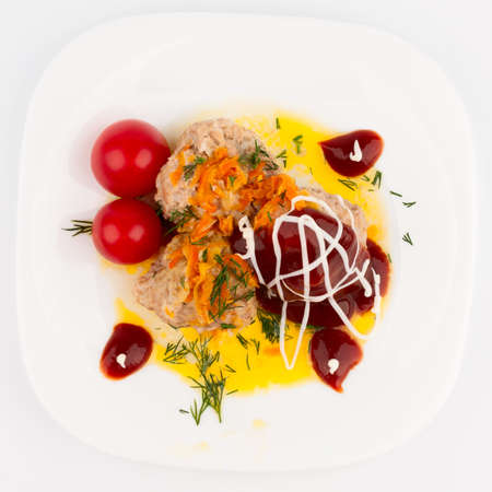Meat balls with tomato sauce filled with cherry tomatoes  Top wievの写真素材