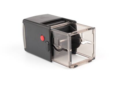 Automatic seal with red button on whiteの写真素材