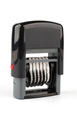 Automatic seal numerator with red button on white backgroundの写真素材