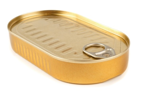 Closed gold metal tin isolated on white backgroundの写真素材
