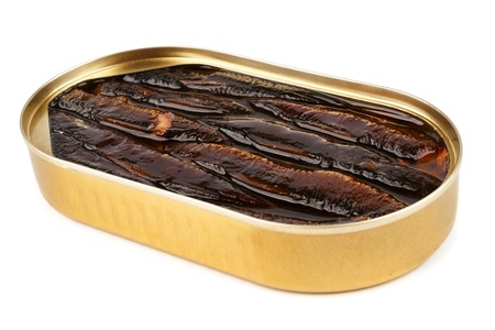 An open oval can of sprats in oilの写真素材