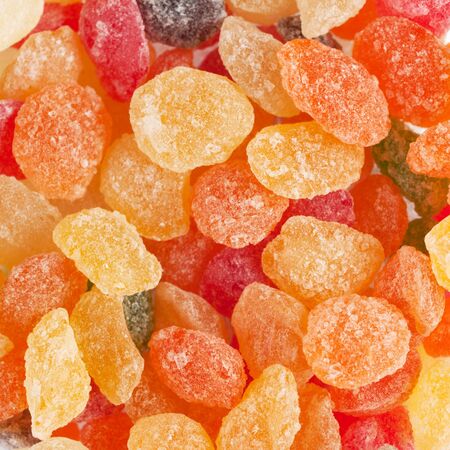 Sugar candies multi-colored all sorts, a backgroundの写真素材