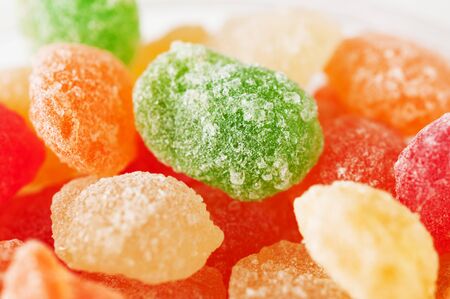 Sugar candies in different colors close upの写真素材