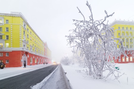 NORILSK, RUSSIA -JANUARY 06, 2014  Leninsky Prospekt  Central is the main and the longest street of the city のeditorial素材