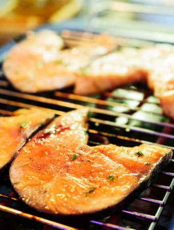 Trout steak fried on an electric grill の写真素材