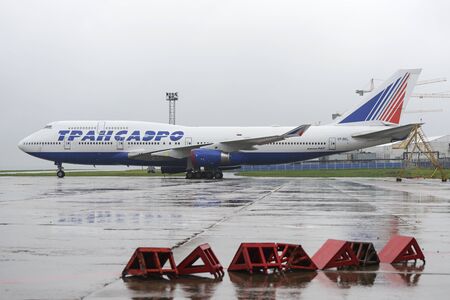 MOSCOW, RUSSIA - MAY 19, 2016: Transaero Boeing 747 in the aircraft stands of the international airport Domodedovo.のeditorial素材