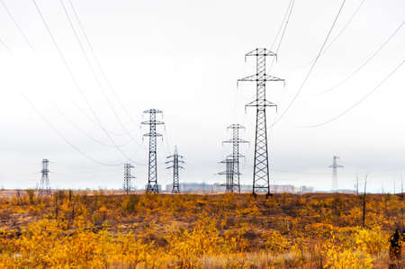 Supports high-voltage line. The tundra in the Arctic Circle, deep autumn. It's a nasty day.