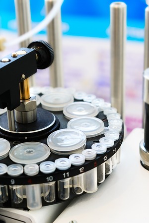 Laboratory automatic machine. Rotating cassette installed in her plastic tubes.の写真素材