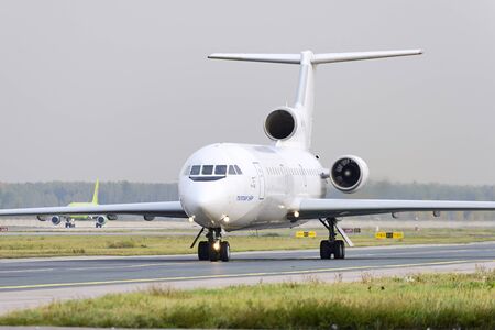 MOSCOW, RUSSIA - SEPTEMBER 26, 2014: Yakovlev Yak-42 Tulpar airlines taxiing. for take off at...