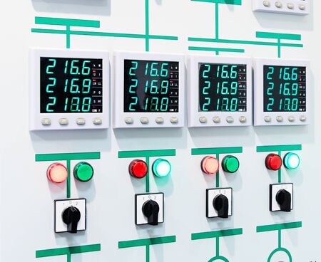 Electric control panel with digital display, switches and signal lamps.の写真素材