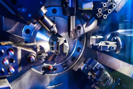 Working machine area for the manufacture of springs. Poor lights.の写真素材