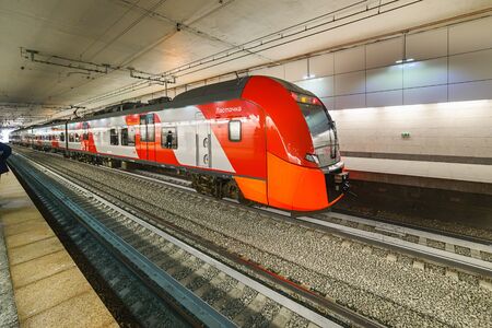MOSCOW, RUSSIA - SEPTEMBER 11, 2016: Moscow Central Circle Line (Moscow Ring Railway) Lastochka commuter train at the underground railway station Gagarins squareのeditorial素材