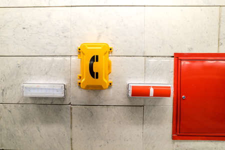 MOSCOW, RUSSIA - SEPTEMBER 11, 2016: Moscow Central Circle Line (Moscow Ring Railway). Emergency signs and emergency telephone at the railway station.のeditorial素材