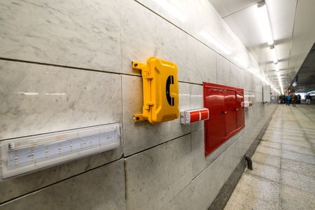 MOSCOW, RUSSIA - SEPTEMBER 11, 2016: Moscow Central Circle Line (Moscow Ring Railway). Emergency signs and emergency telephone at the railway station.のeditorial素材