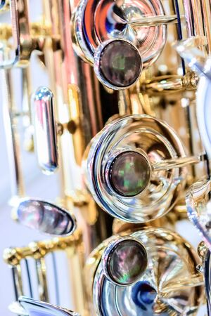 Shiny alto saxophone with detailed view of keysの写真素材