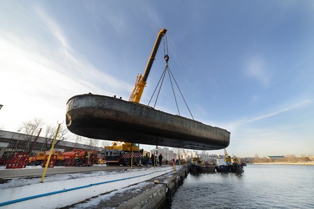 MOSCOW, RUSSIA - NOVEMBER 11, 2016: State Unitary Enterprise Mosvodostok performs recovery vessels...