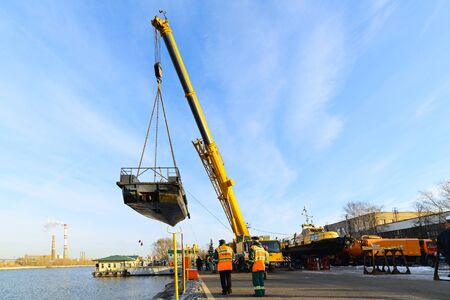 MOSCOW, RUSSIA - NOVEMBER 11, 2016: State Unitary Enterprise Mosvodostok performs recovery vessels...