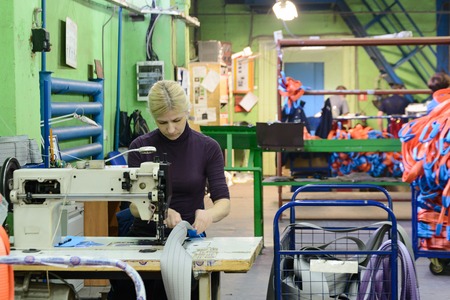 NIZHNY NOVGOROD, RUSSIA - NOVEMBER 28, 2016: Sewing workshop for production of nylon down cargo straps.のeditorial素材