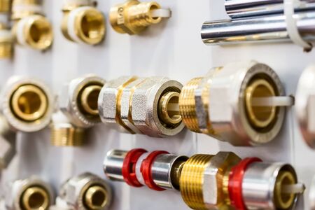 A variety of plumbing pipe connectors, corners, fittings, nipples.の写真素材