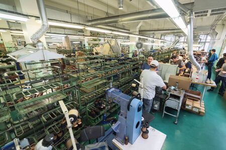 MOSCOW, RUSSIA - FEBRUARY 21, 2017: Moscow shoe factory JSC RALF RINGER. The conveyor of the shoe factoryのeditorial素材