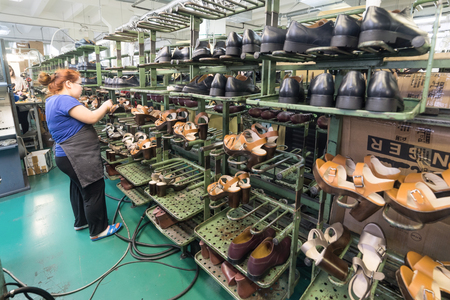 The conveyor of the shoe factoryのeditorial素材