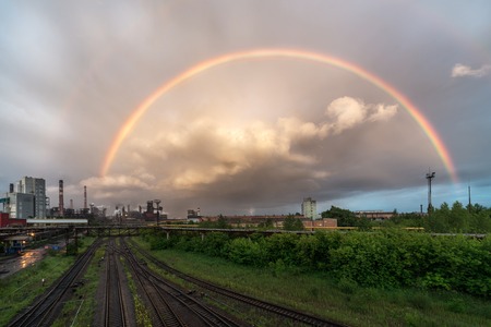 A colored rainbow above the metallurgical plant.のeditorial素材