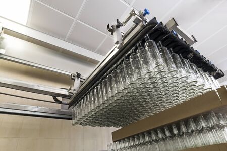 Unloading of glass bottles from pallets.の写真素材