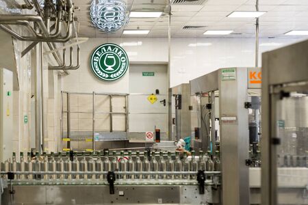 Brest Distillery. The shop for bottling vodka, automatic filling machines.のeditorial素材