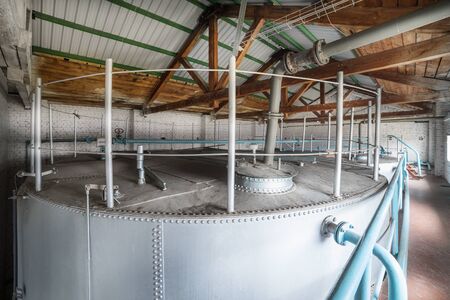 Metal cisterns installed inside the building.の写真素材