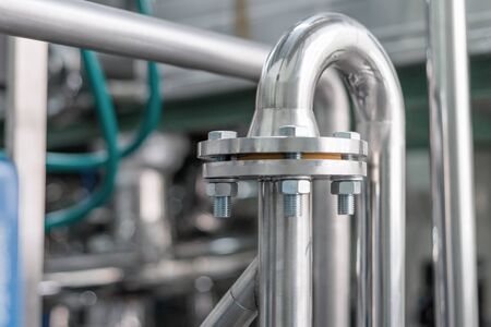 Steel bent pipe with flanges.の写真素材